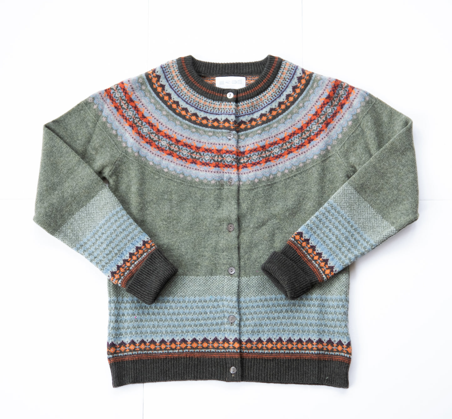 Green cardigan with patterned collar and cuffs on a white background