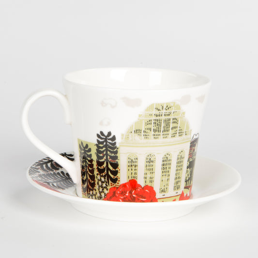 Cup and saucer on white background