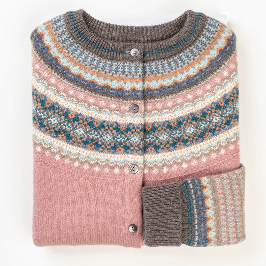 Knitted sweater with a colorful pattern on a white background