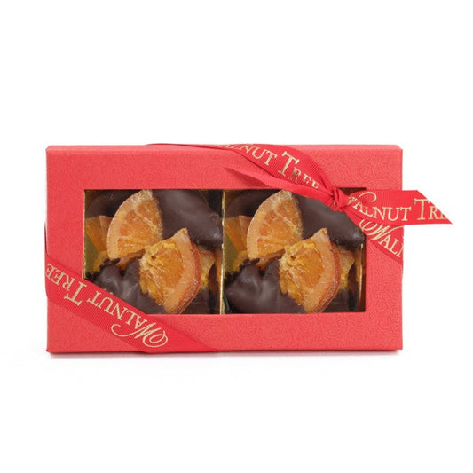 Red box of chocolate-dipped orange slices with Walnut Tree' branding on a white background