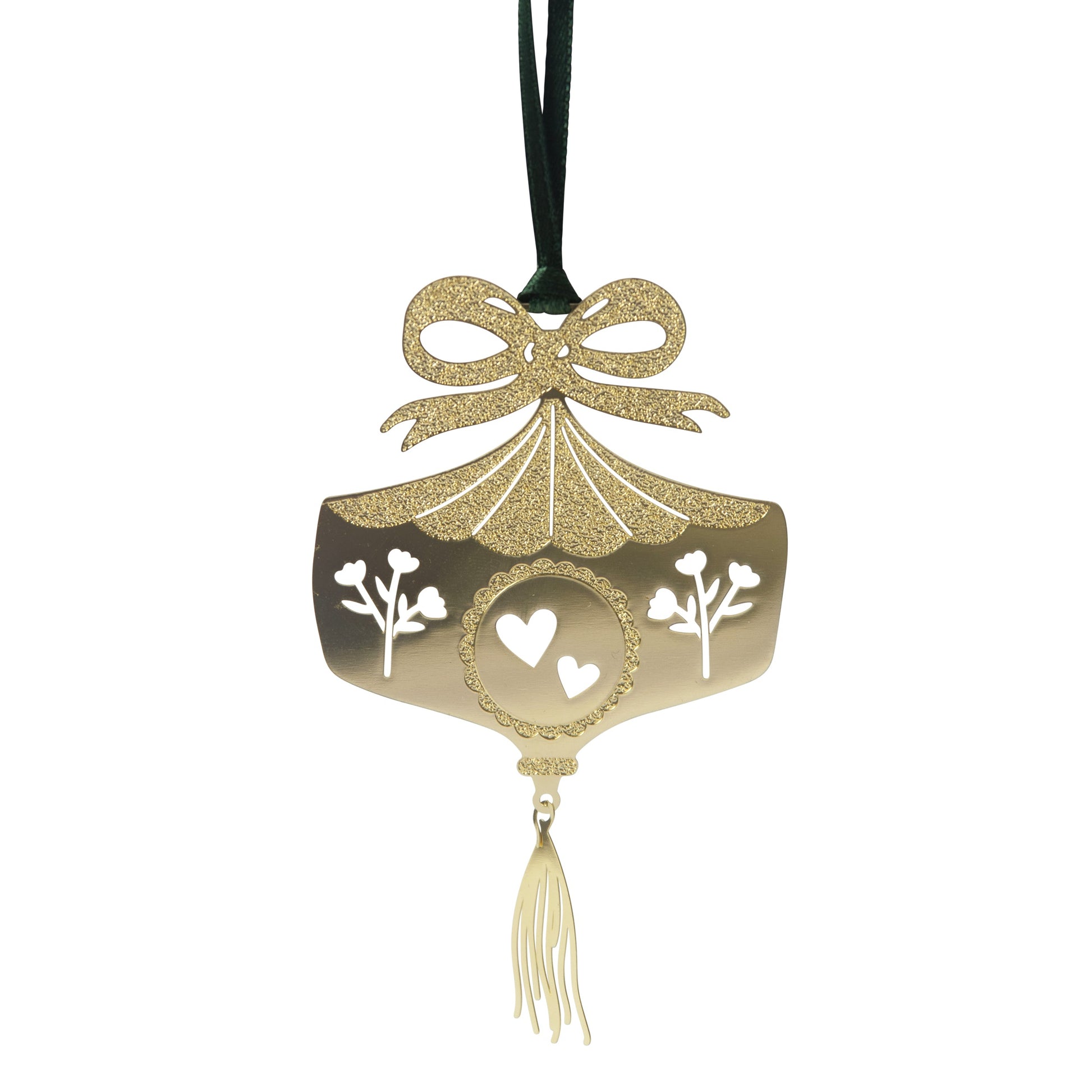 Decorative gold ornament with bow and tassel on a white background