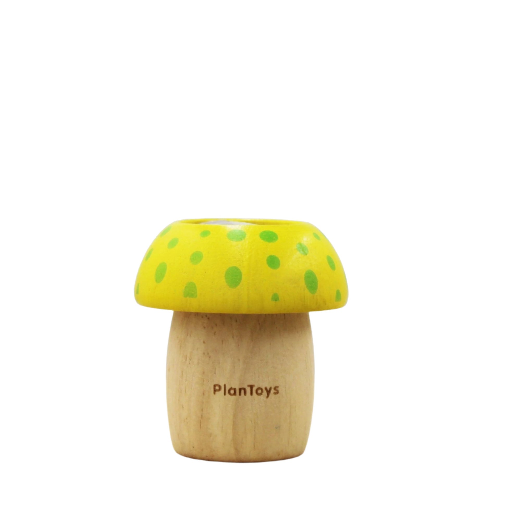 yellow wooden toy kaleidoscope mushroom