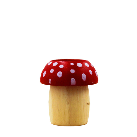 red toy kaleidoscope mushroom