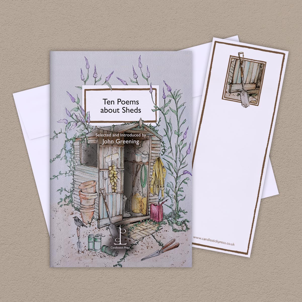 The Poem Pamphlet, 'Ten Poems about Sheds' sits on a beige background with the bookmark and white envelope.